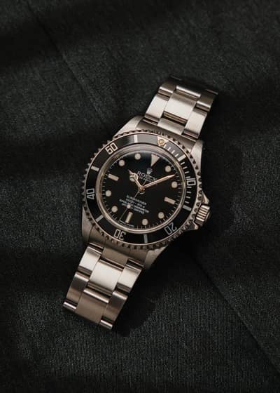 WATCH BUYERS / Rolex Submariner Cartier Piaget Graham Rado Jubile IWC