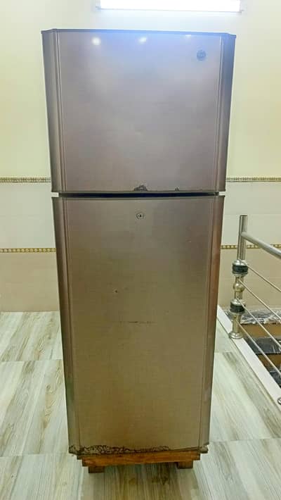 Pel refrigerator for urgent sale (metallic gold brown)