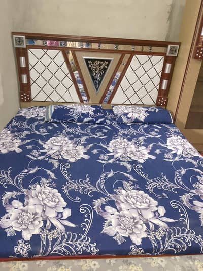 bed sheet and almari