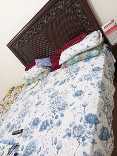Wooden bed made from Taal wood  designed and crafted in timber market
