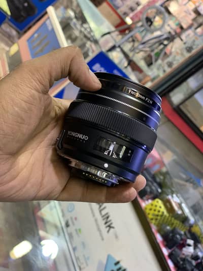 Dslr lens naikon 100. mm f2N yongno naikon mund 20000/= 03212306356