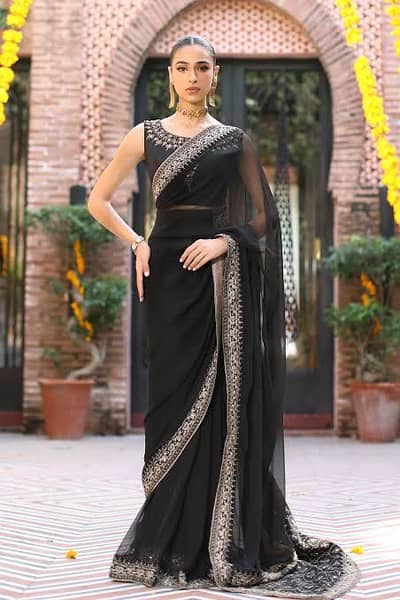 Royale black chiffon saree available in new condition