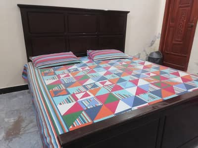 wooden double bed