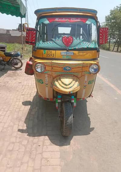 Tezraftaar auto rikshaw