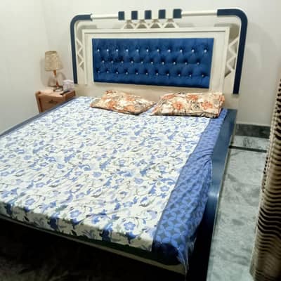 king size double bed with 2 side tables in deco paint
