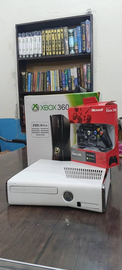 Xbox 360 slim with all accessories 64 games
