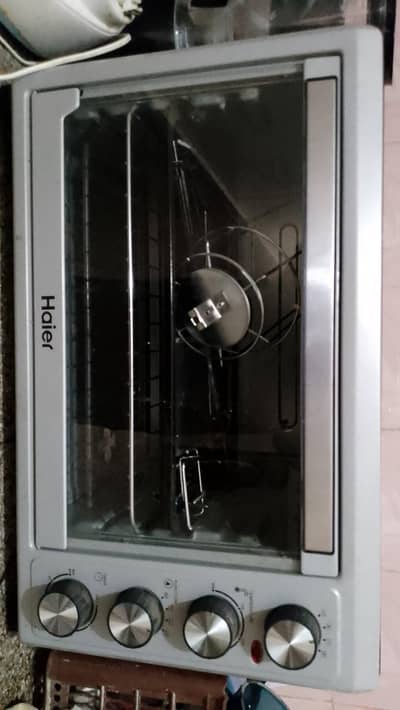 Haier electri oven with rotisserie and baking tray and rack