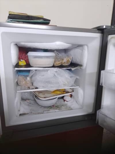 Haier refrigerator red color glass door. . . used like new. .