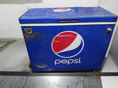 Glass door fridge and Pepsi freezer