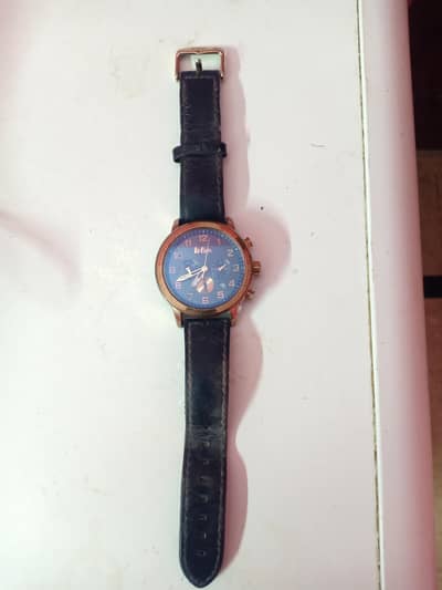 Men's watch for sale in running condition.