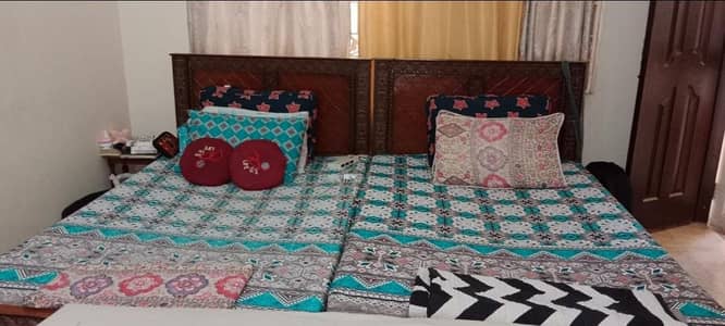 2 single wooden bed with matress
