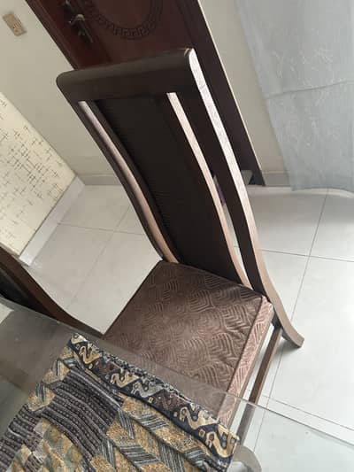 6  chairs and Solid wood Glass top dining table