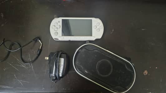 Good condition. Charger, extra wire, 5-7 pre-installed games