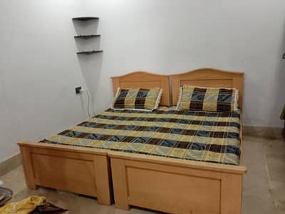 2 single beds with mattresses for sale