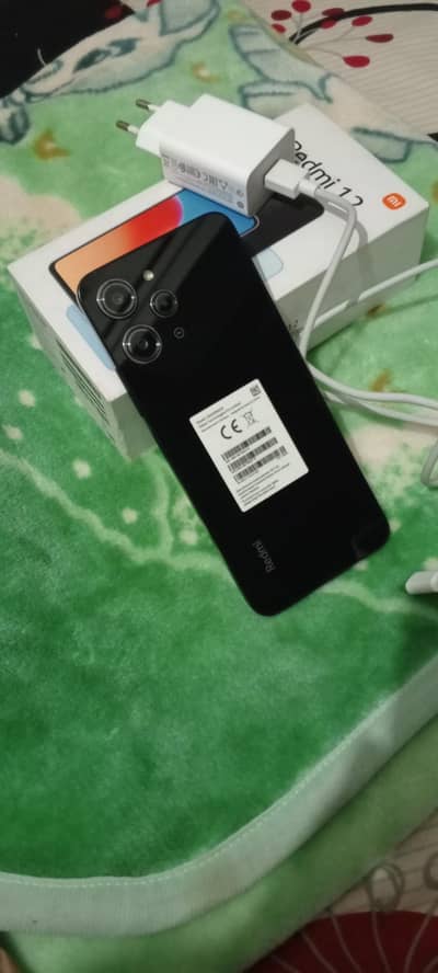 Redmi 12 with box and charger 8+8/128