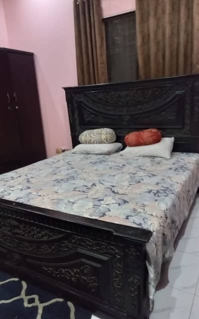 Bed and dressing table