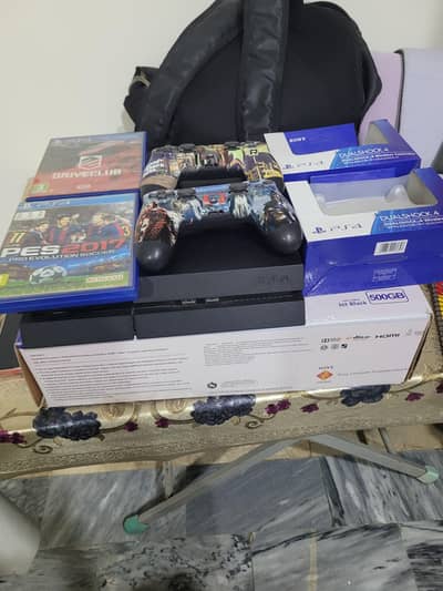 Ps4 500GB FAT with box and controllers gaming bundle