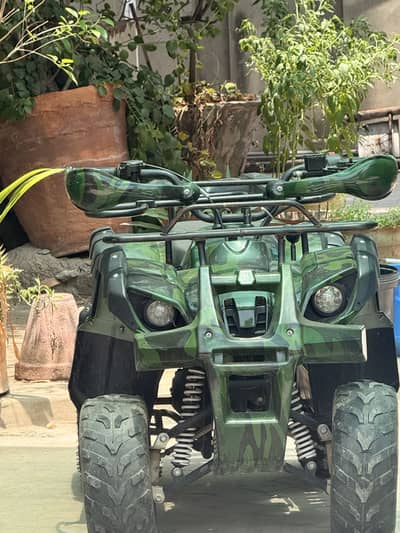 125cc quad bike (just like new)