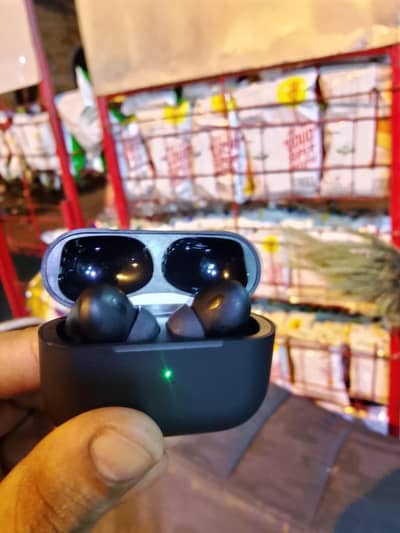 used earbuds with one cover and charge cable