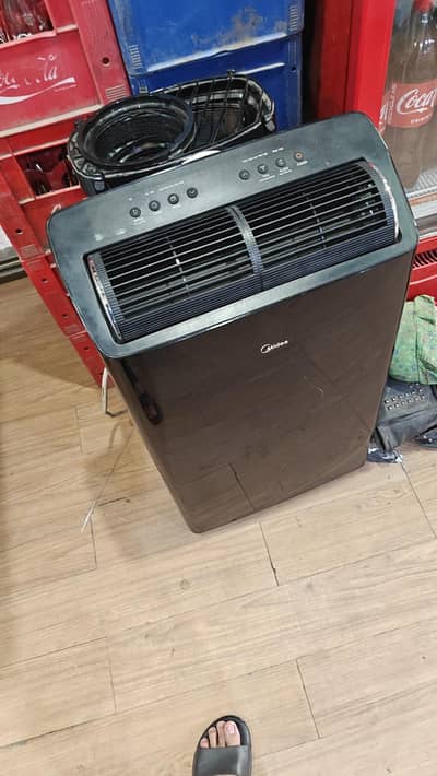 midea portable ac all ok heat and cool like new