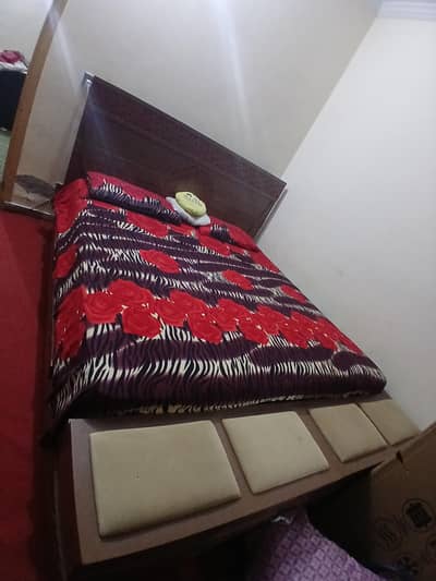 wooden bed with side table dressing and cupboard for sale