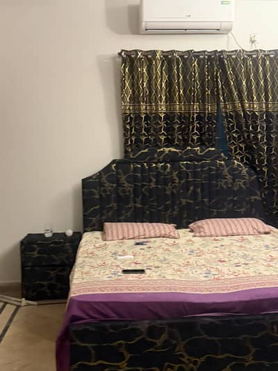 Bed with sidetables