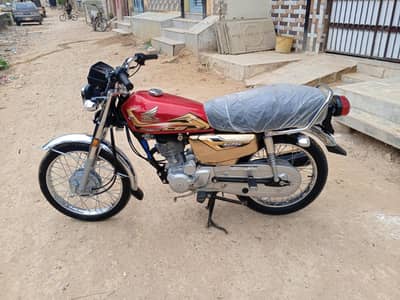 Honda 125 Model 26 gold addition self start applied