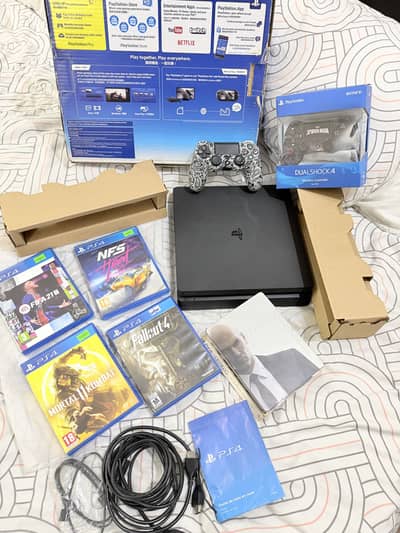 Ps4 Slim 500gb 5 games and 2 controllers