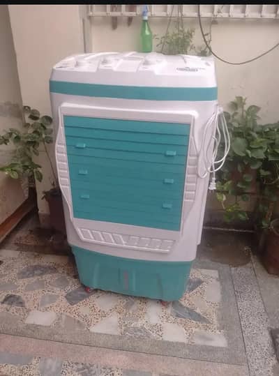 new condition air cooler do Sal warranty 10 by 10