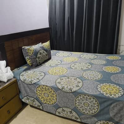 Queen size bed with spring mattress