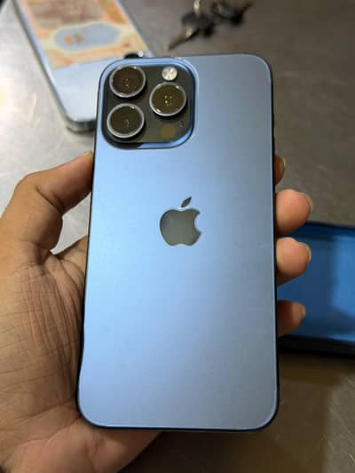 iPhone 15 Pro Max blue titanium waterpack 256gb