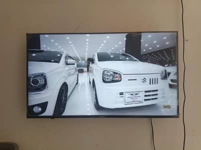 new condition with complete accessories and covered screen tv smart