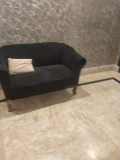 two sofas available one l shaped and a small sofa set