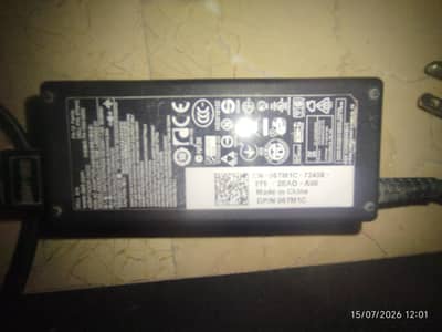 Dell 65W AC power adapter from the "PA-12 Family".