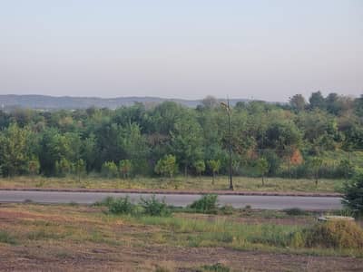 bahria enclave 10marla plot with extra land front open investor price