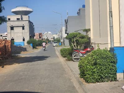 Title: 5.33 Marla Downtown Commercial Plot for Sale | Main Boulevard | Al-Kabir Developers