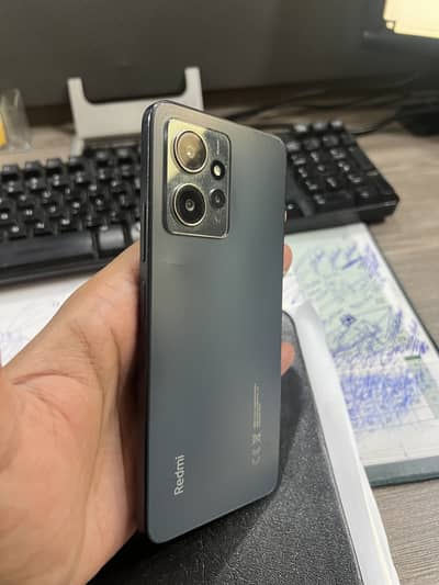 Redmo Note 12 used phone 9/10 condition with charger and box