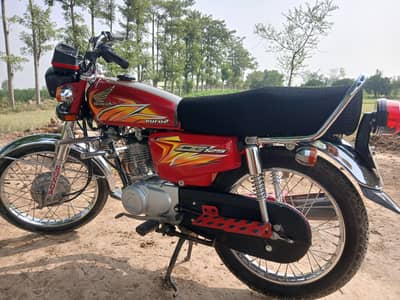 125 model in red colour