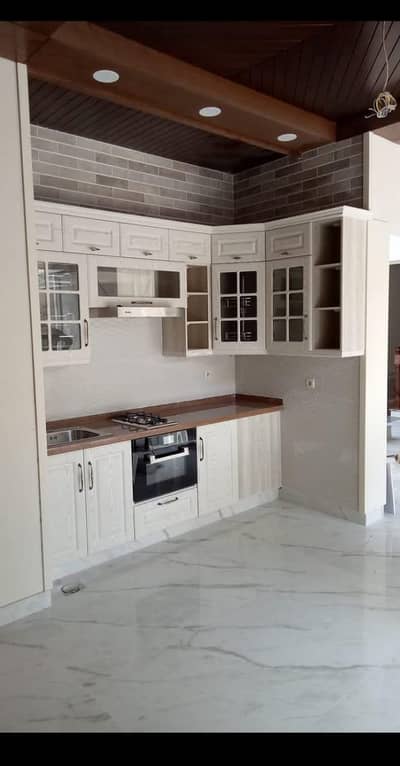 kitchen almari and office tables and LCD wall