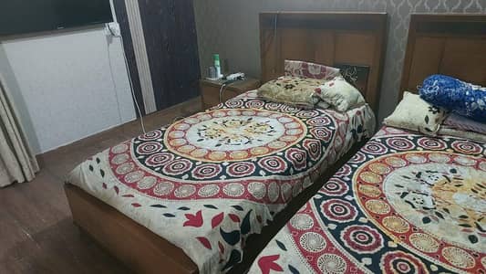 wooden single beds side tables