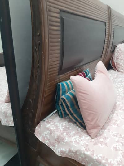 Two Single beds along with mattresses