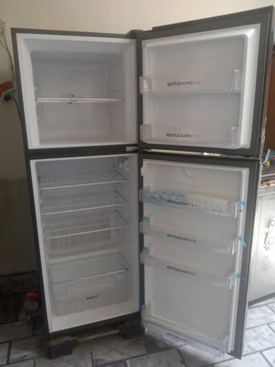 Haier refrigerator medium size red mehroon black shade 10/9 condition