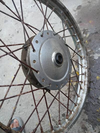 Honda 125 Parts/ front wheel Hub orignal