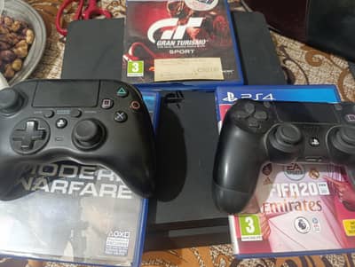 PS 4 with 3 games and two controllers