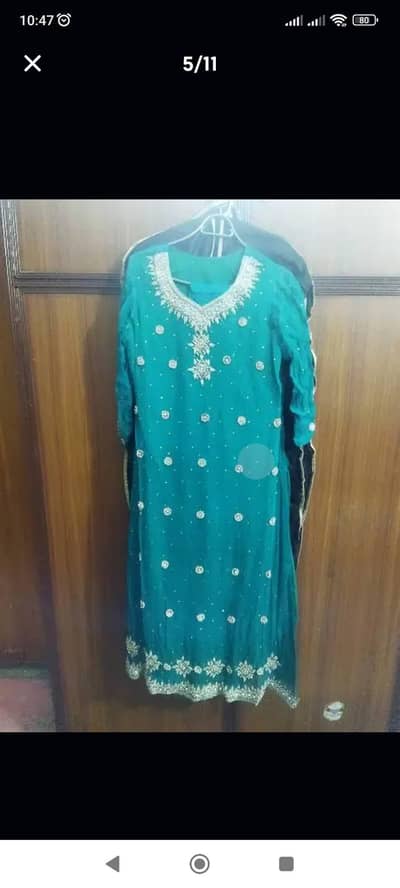 formal dress with heavy embellishments