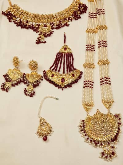 Elegant Tappa Kundan Bridal Jewelry Set with Red Beads & Pearls 