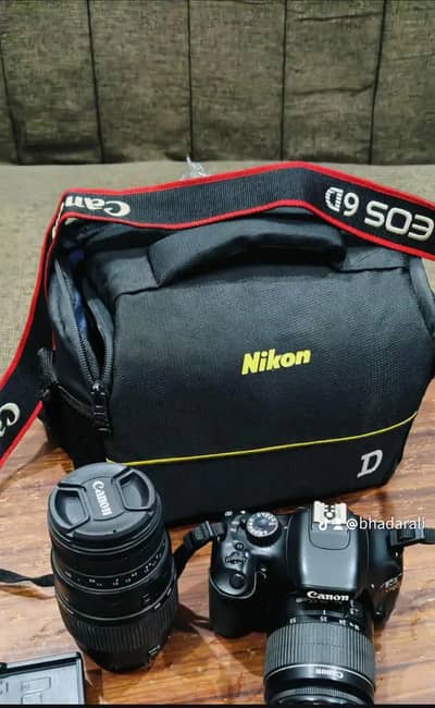 Canon D550,with two lense 1855 & 70300 and two batteries with box plus