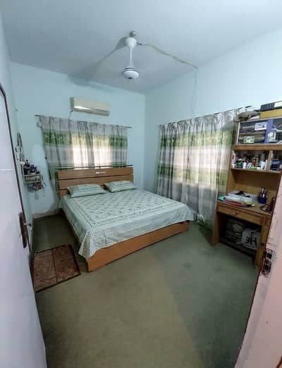Double bed with cupboard