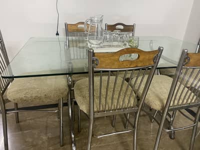Selling my recently chromed 6 seater dining table with glass top