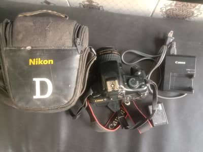 Canon DSLR 1100. d. camera